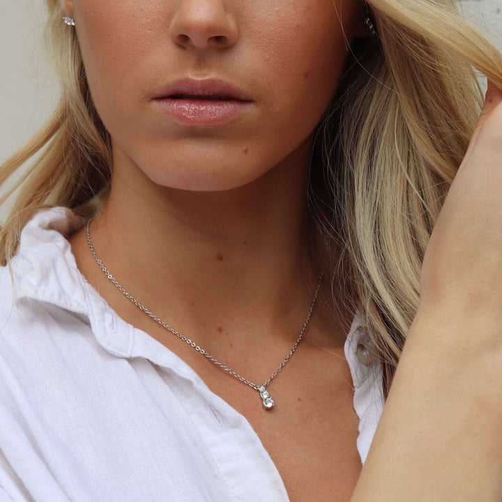 Attract Trilogy Round Pendant with Swarovski Ruby and Clear Crystals Rhodium Plated