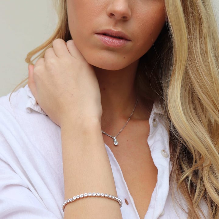 Attract Trilogy Round Pendant with Swarovski Ruby and Clear Crystals Rhodium Plated